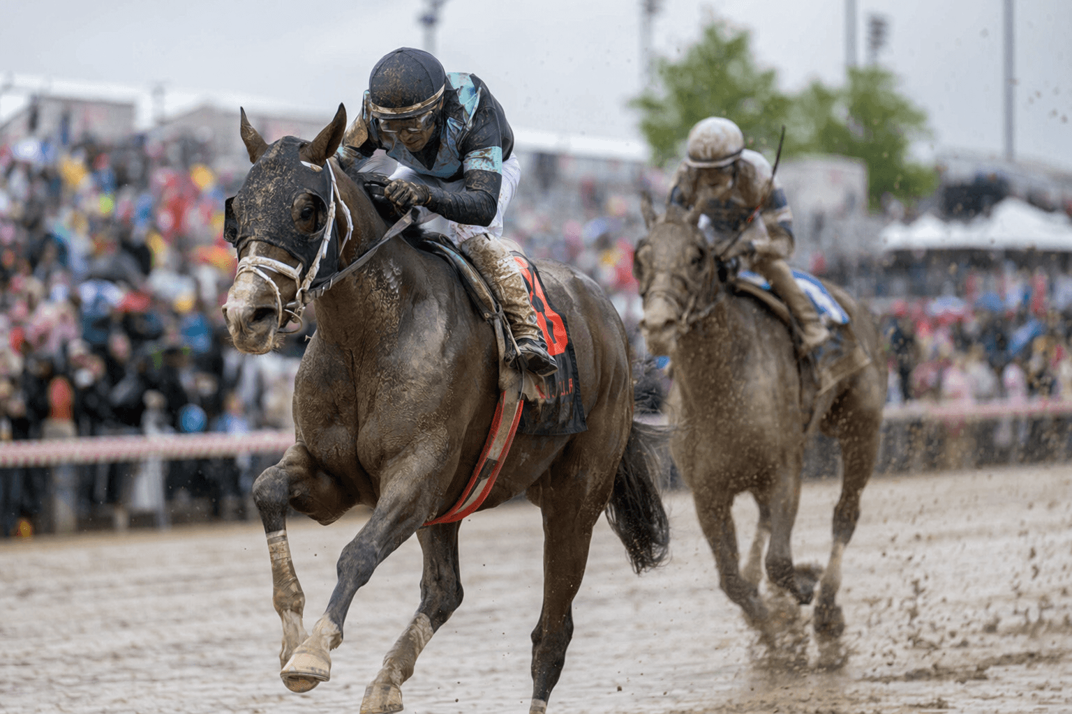 Napoleon Solo holds off Iron Honor to win the Preakness