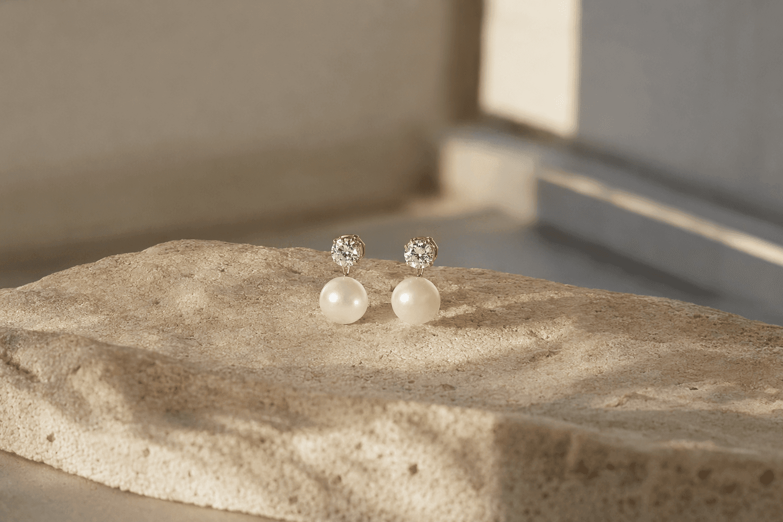 Astrifer earrings hide connectors to make pearls appear to float