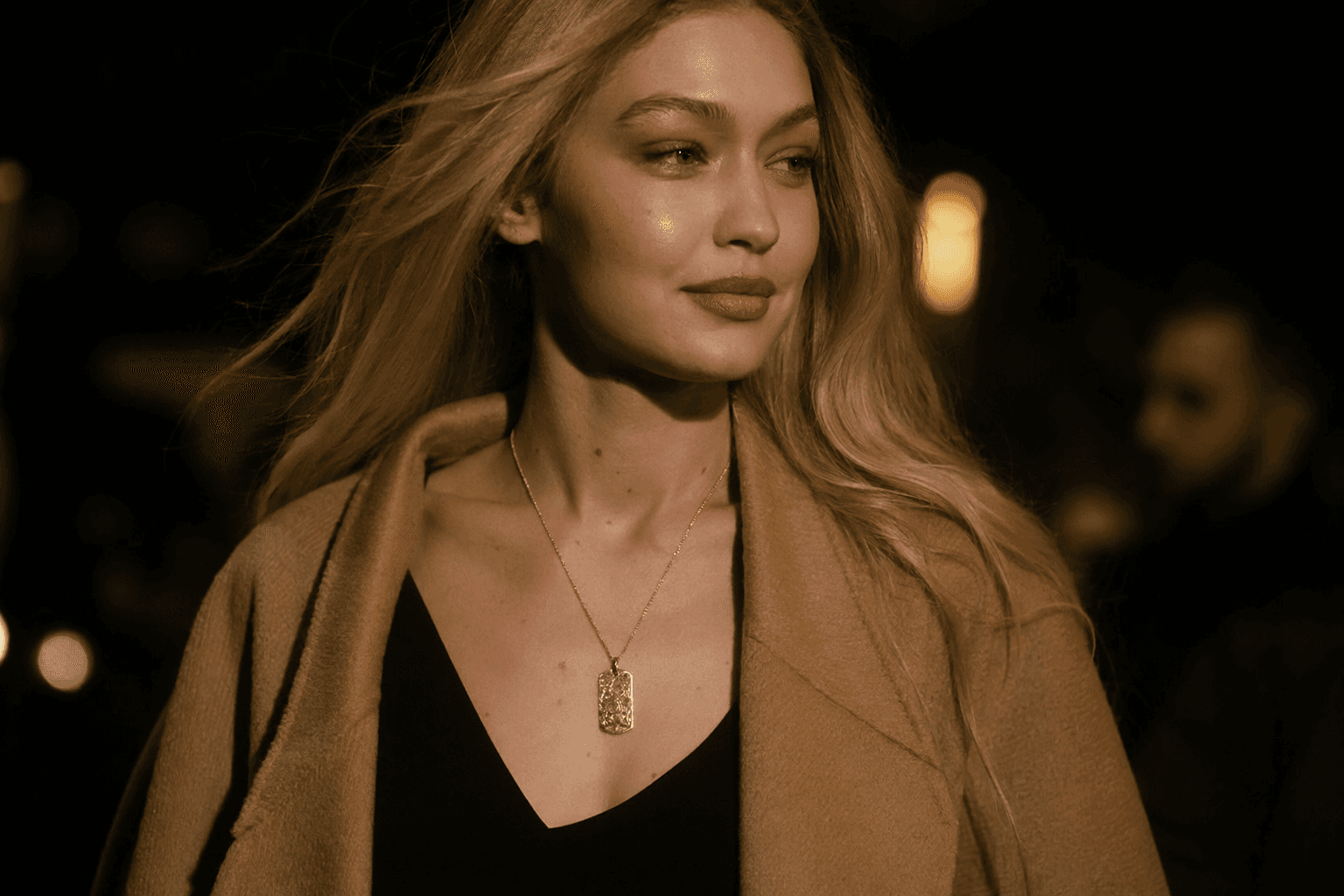 Gigi Hadid shares gold dog-tag necklace nod to Bradley Cooper