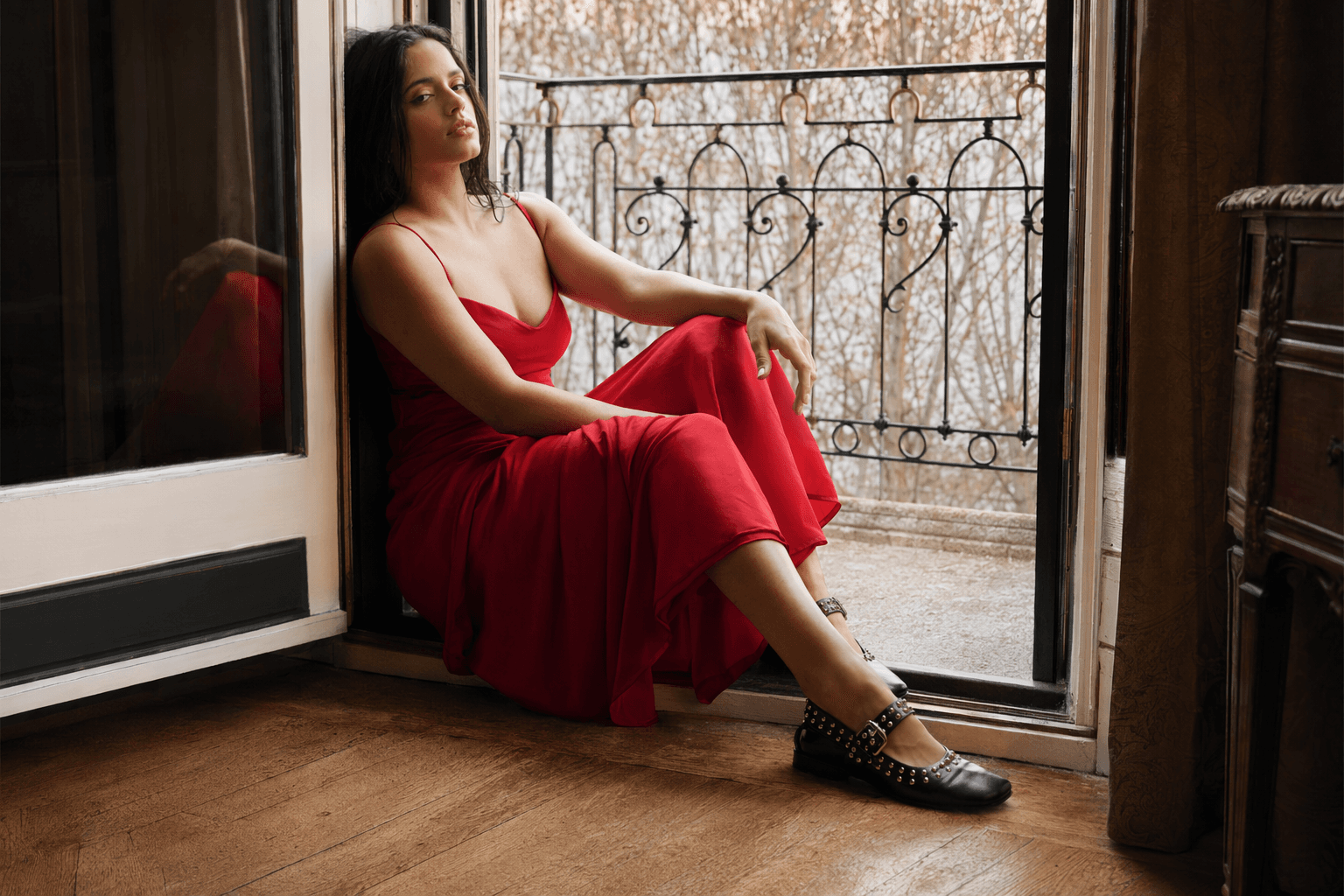 Rosalía's studded Mary Janes turn a red dress punk-rock chic
