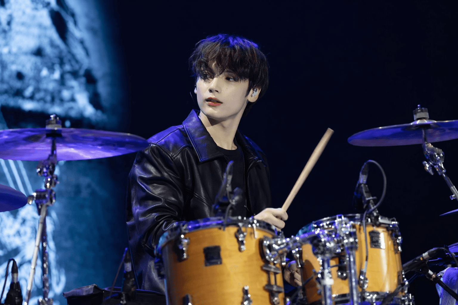 Huening Kai drums with TXT at Korea University festival