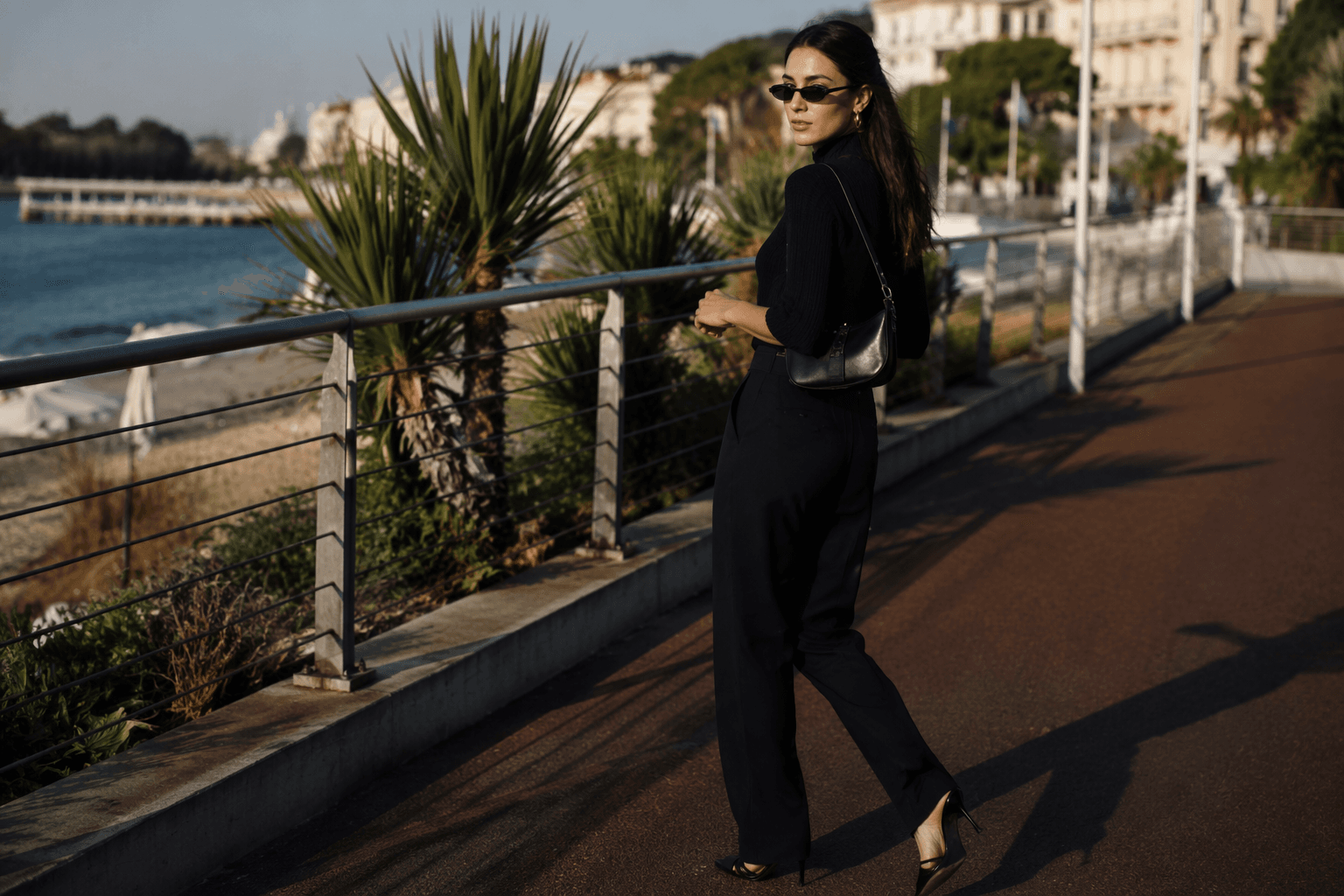 Bella Hadid makes pants and heels feel effortless with Coach bag
