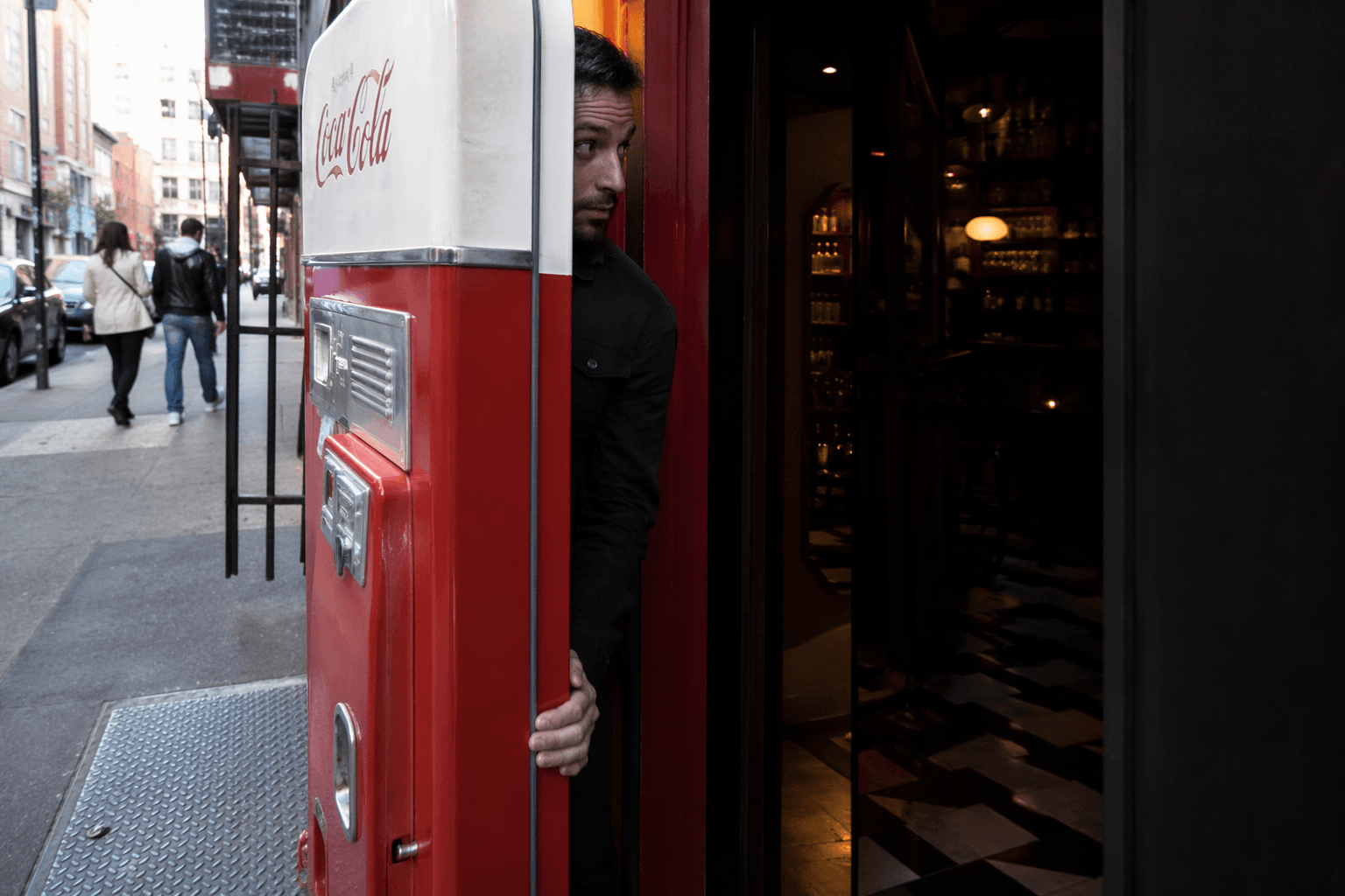 Highball hides behind a soda machine in Little Italy