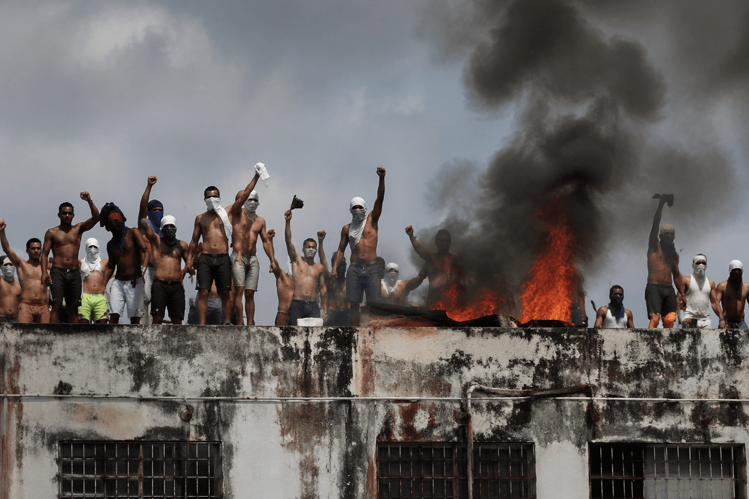 Venezuelan inmates protest prison conditions, say guards opened fire