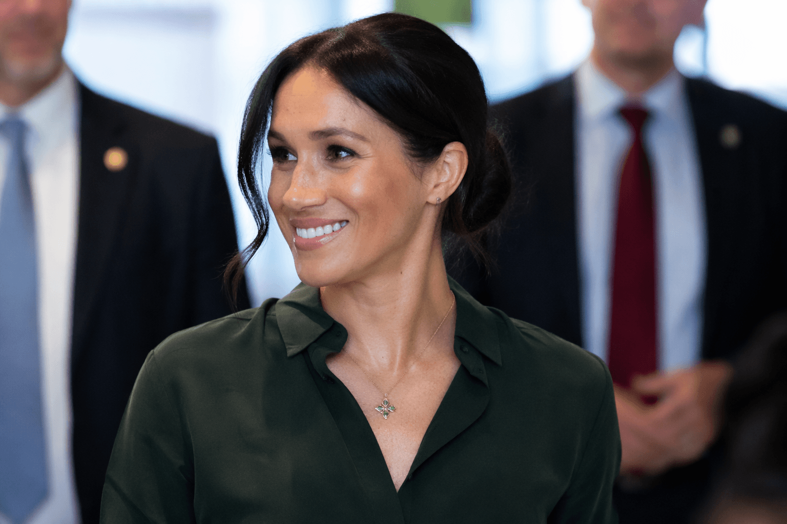 Meghan Markle wears Logan Hollowell gold necklace with family symbolism in Geneva