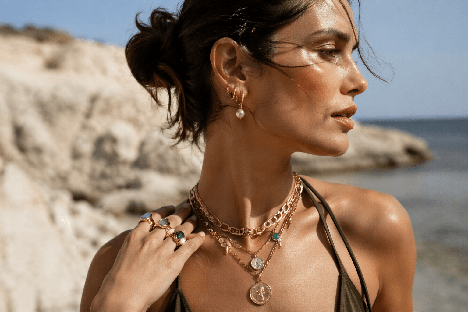 Summer 2026 gold jewelry turns bold, playful, and layered