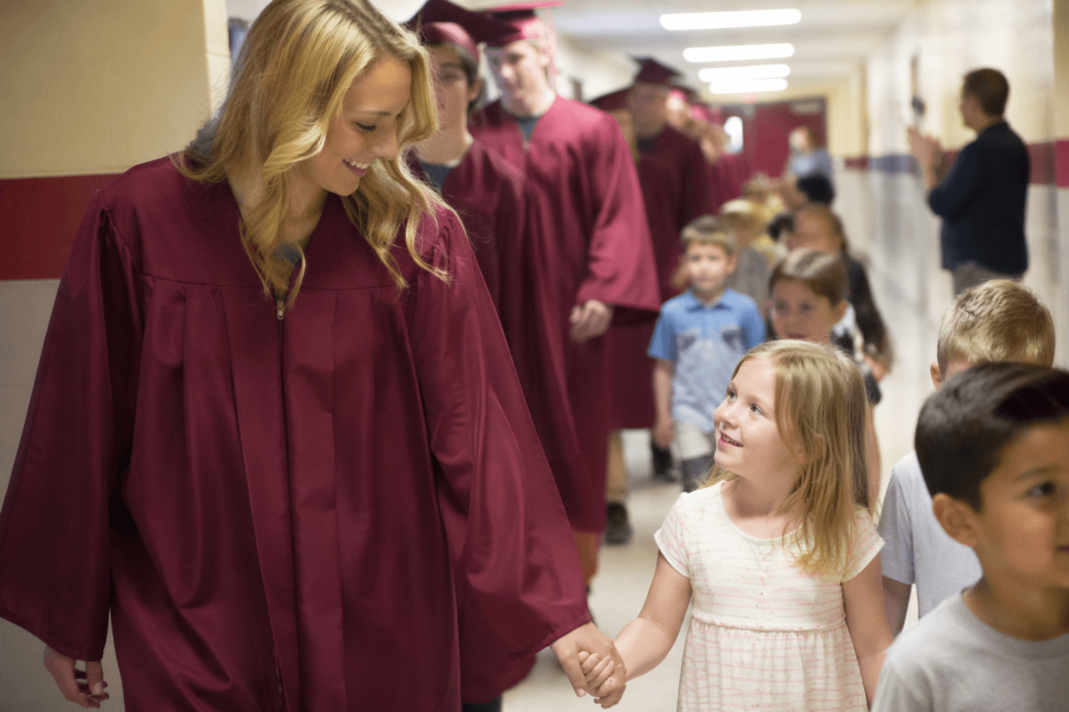Rock River kindergarteners and seniors parade to mark school milestones