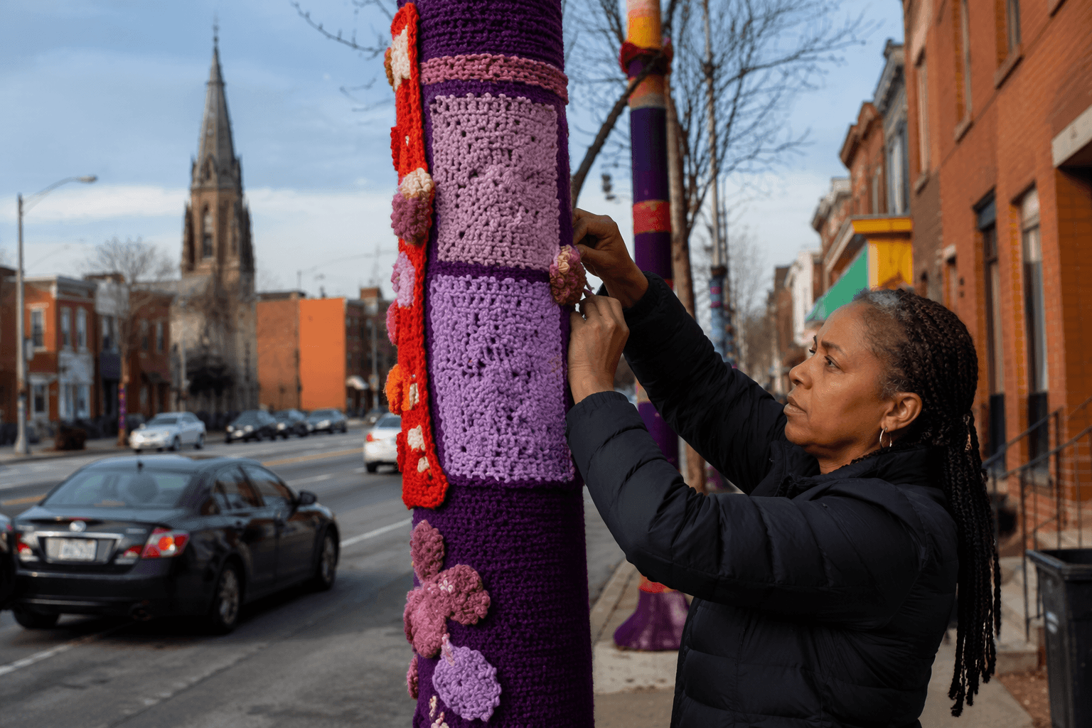 Pigtown neighbors yarn bomb Washington Boulevard with colorful lamppost art