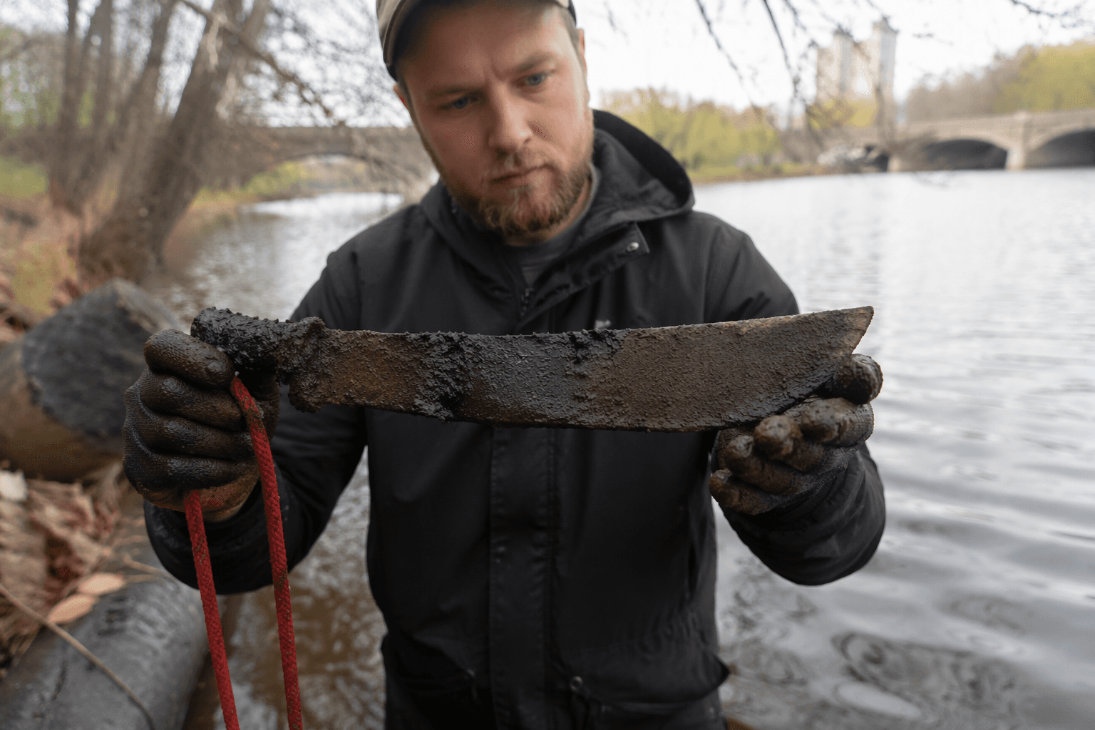 Magnet fisher pulls historic blade from water, hinting at lost history