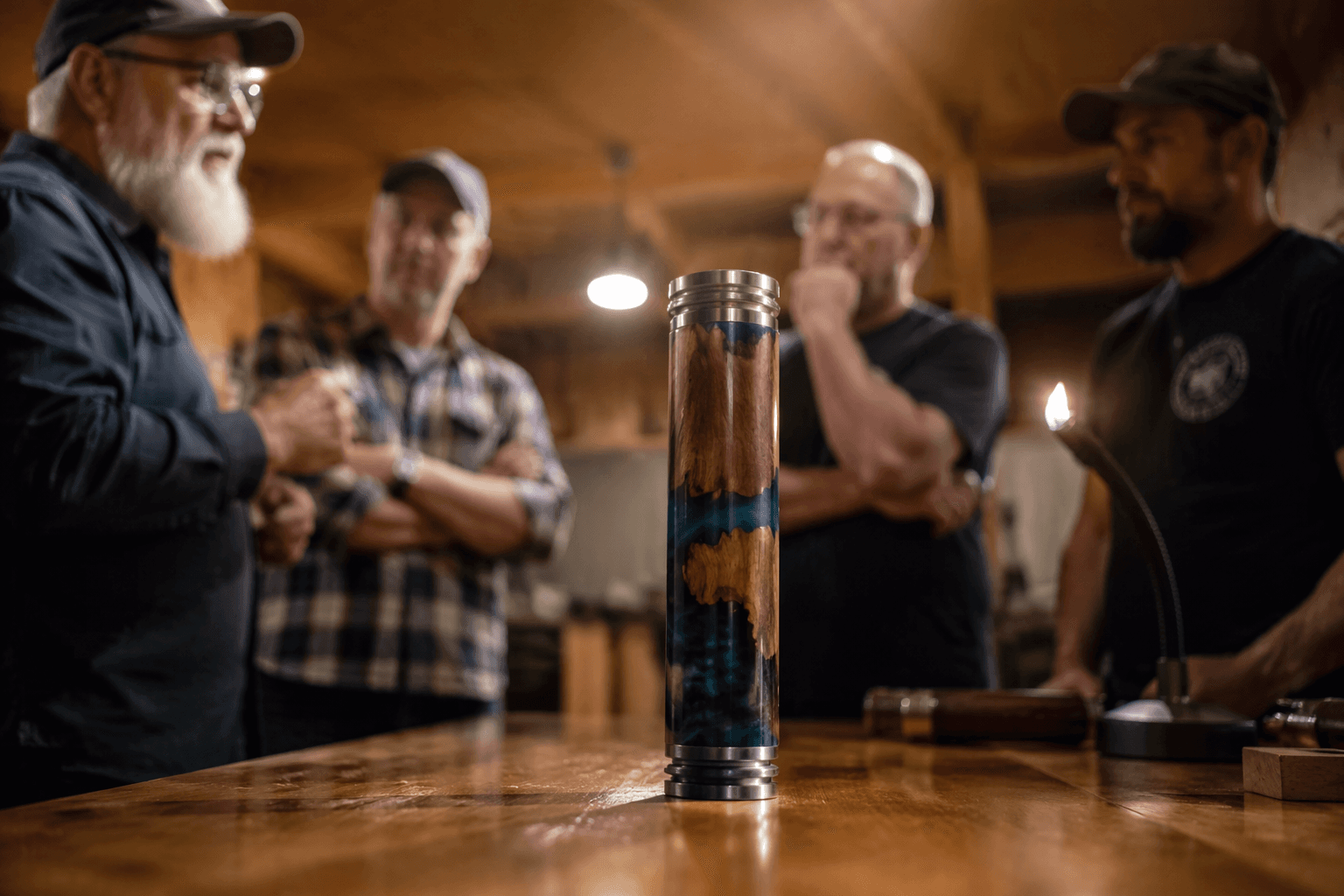 Applewood torch blends epoxy and Britannia pewter on the lathe