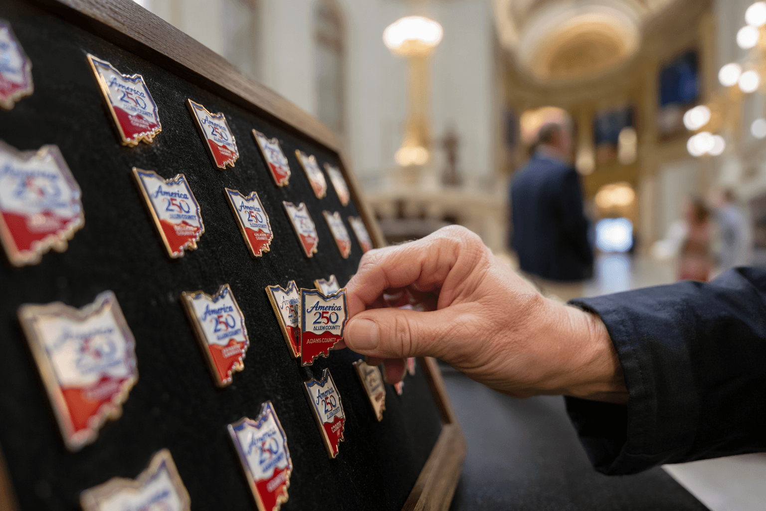 Ohio Statehouse Museum Shop sells America 250-Ohio Adams County pin