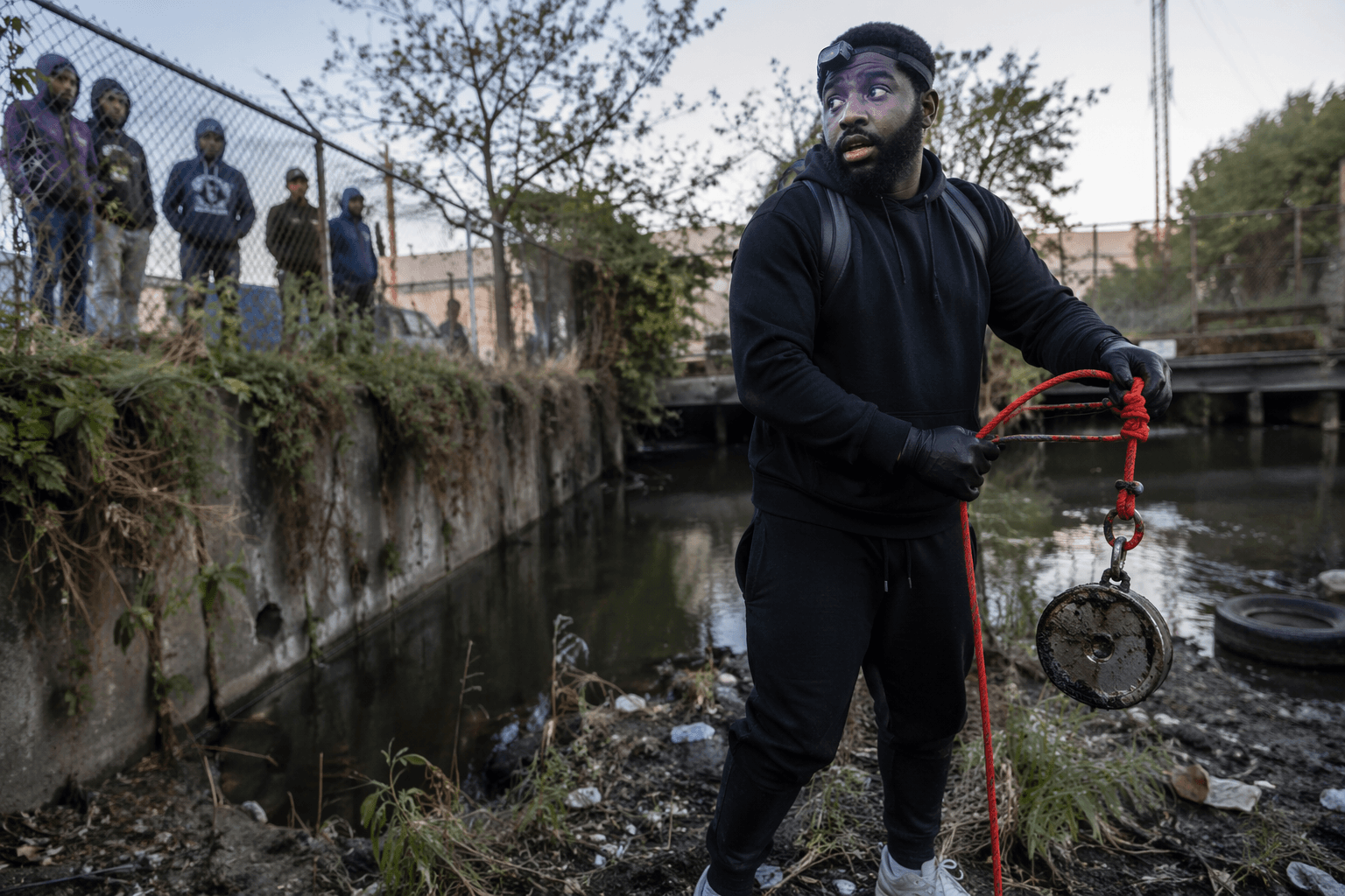 Magnet fishing in the hood turns cleanup into a tense local event