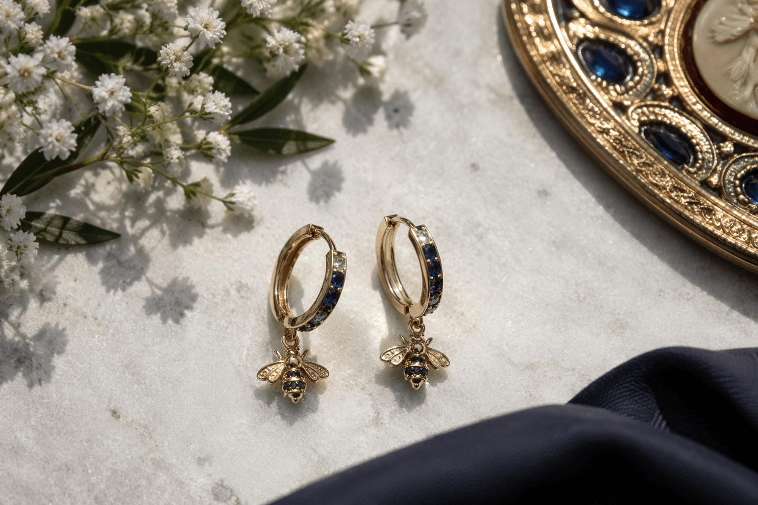 Princess Kate wears bee hoop earrings, a symbolic Manchester tribute