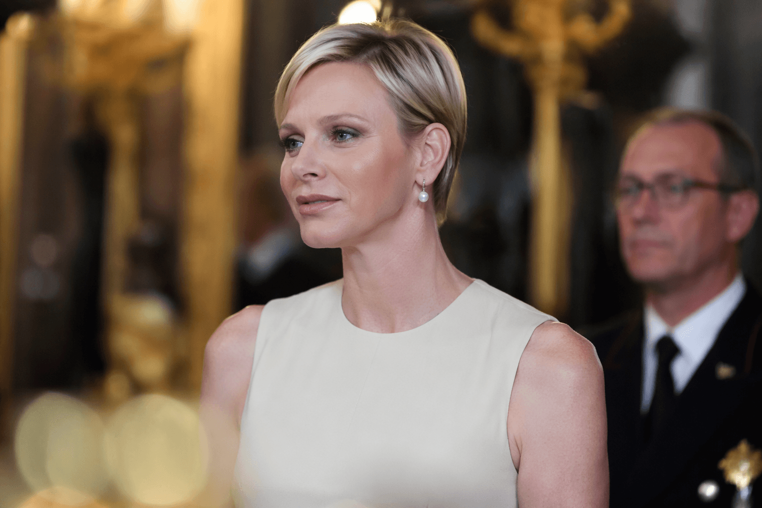 Princess Charlene wears pearl drop earrings at Madrid royal outing