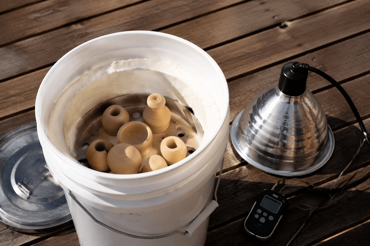Turners debate a simple bucket kiln for drying small pieces