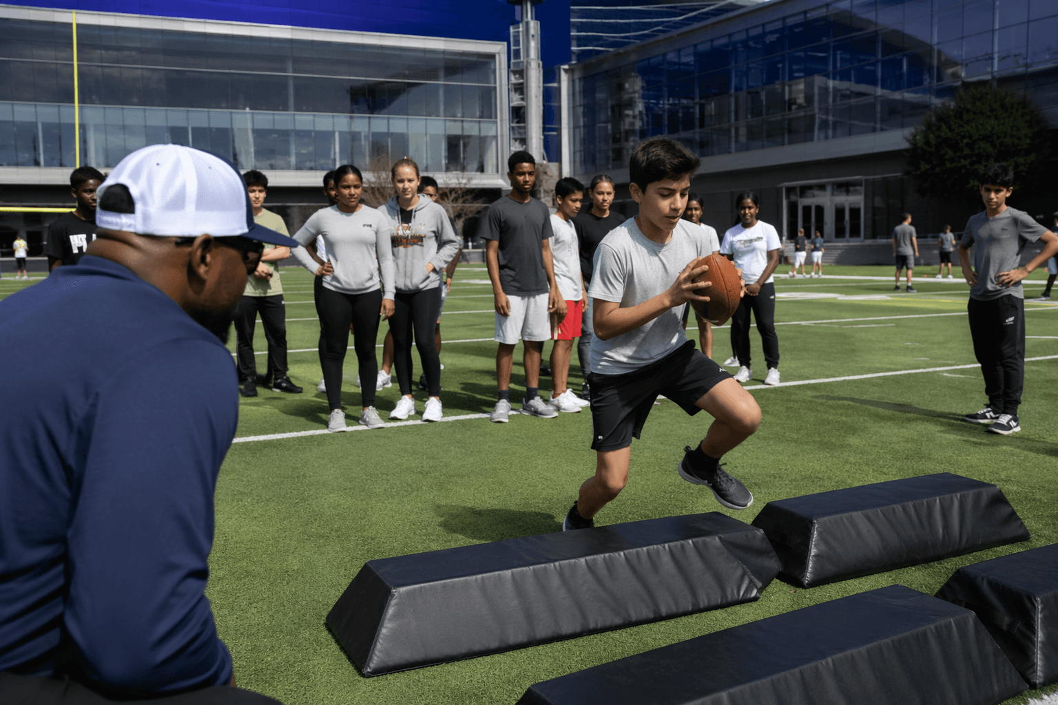 Middle schoolers turn football drills into STEM lessons at The Star