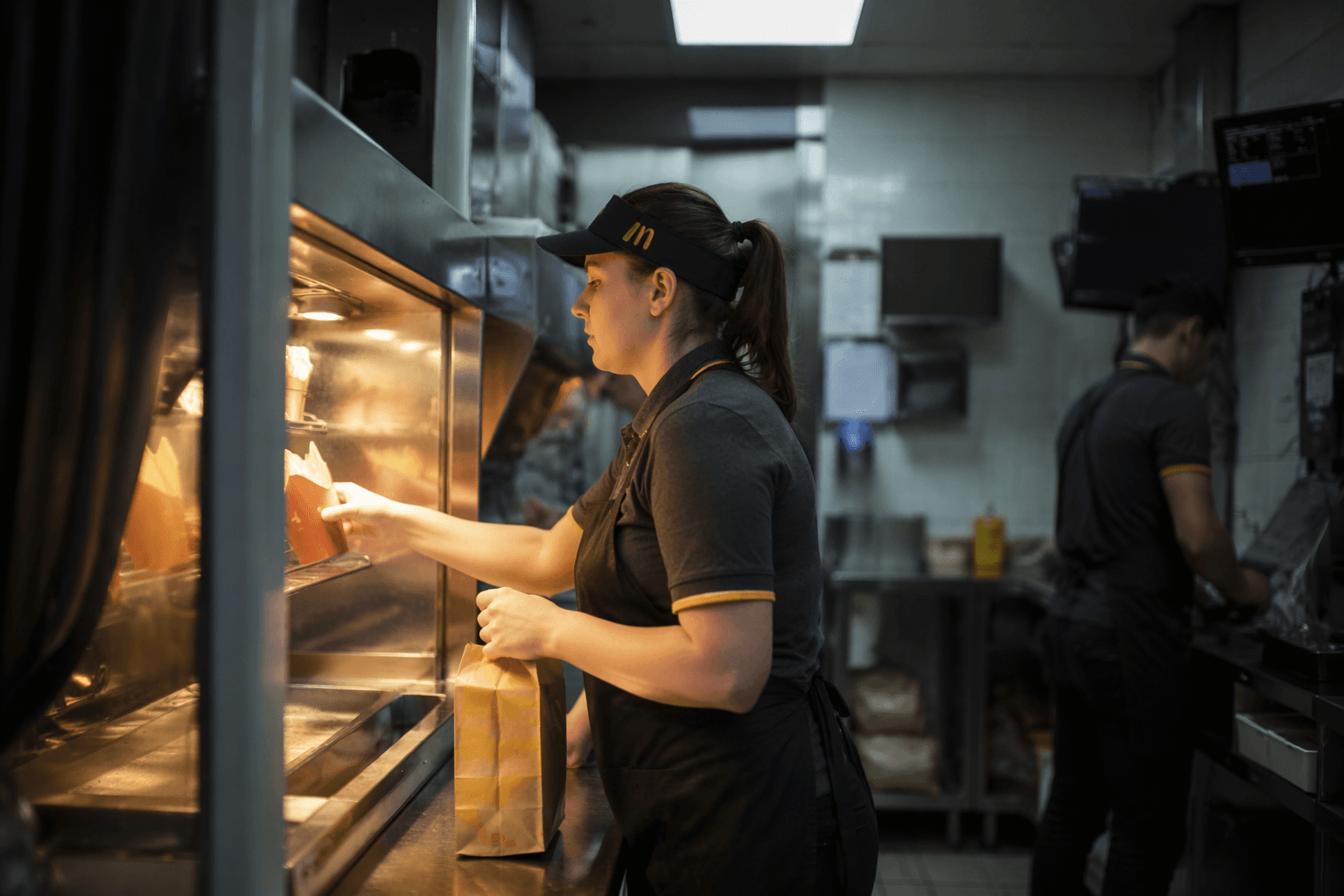 Real wages fell, McDonald's workers may feel raises less