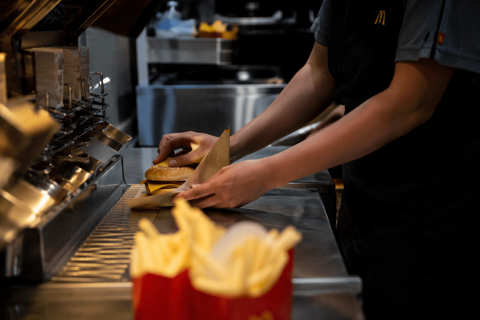 McDonald’s workers face slower menu price hikes, but inflation stays high