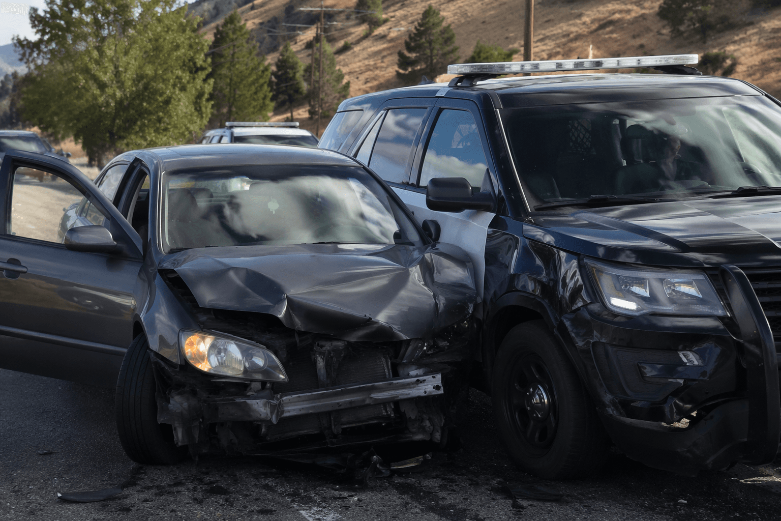 Park City man charged after chase, crashes into police cars