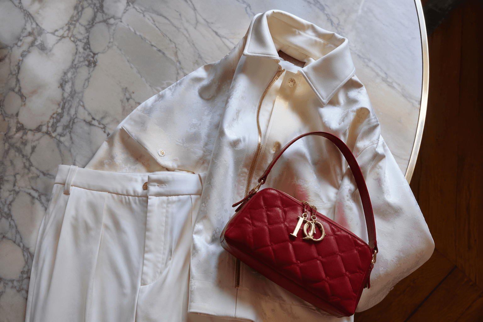 Lauren Sánchez Bezos turns a white Louis Vuitton look into a statement with rare red Dior bag