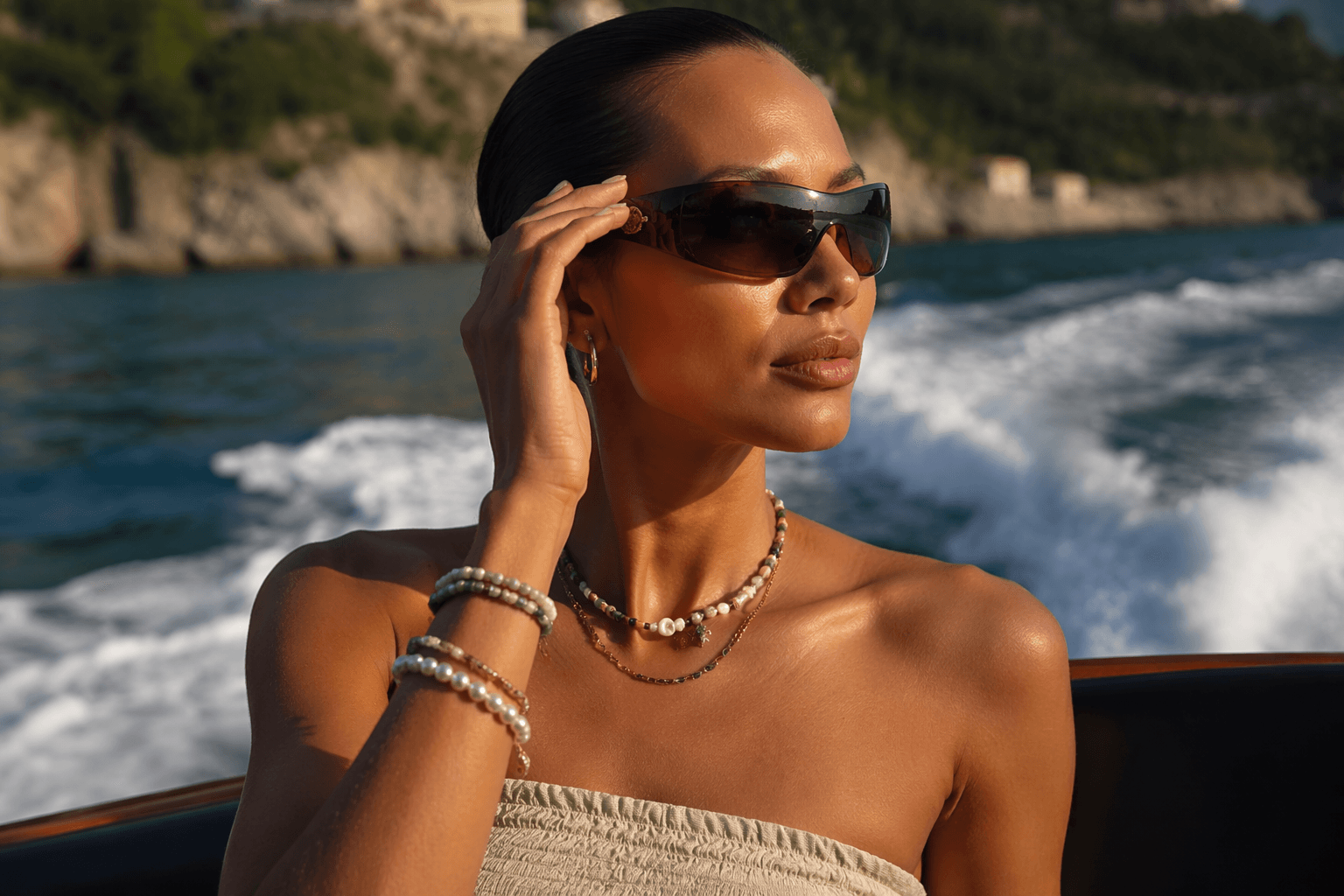 NET-A-PORTER spotlights summer gift ideas with beaded jewelry and wraparound sunnies