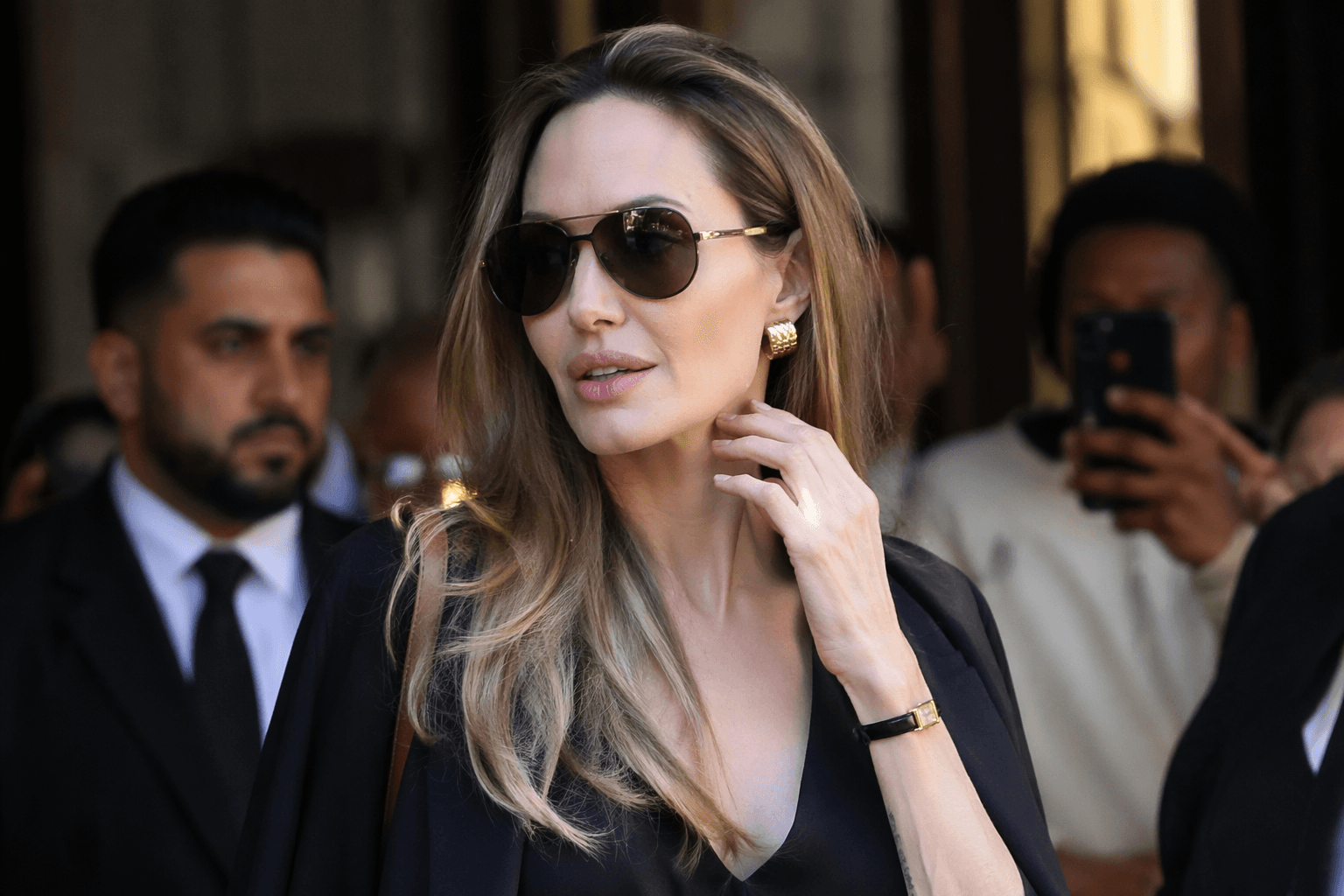 Angelina Jolie returns in gold accents for Couture screening in New York