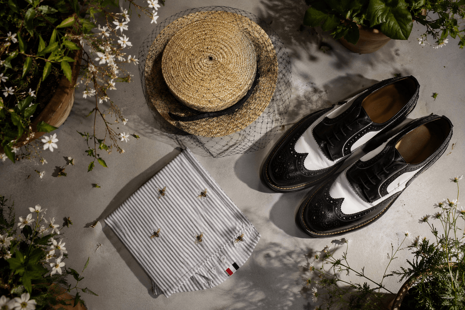 Thom Browne brings garden-party prep to Milan with insect motifs