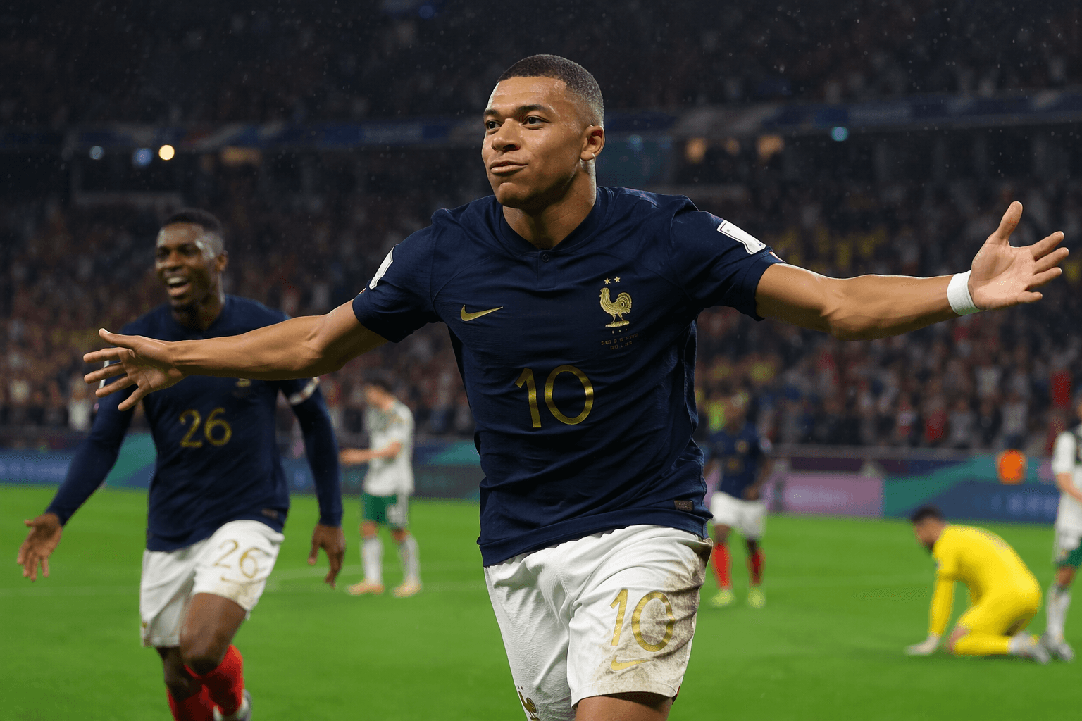 Mbappé double leads France past Iraq into knockout stage