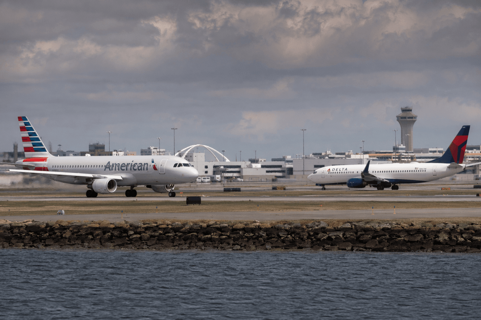 NTSB probes near miss between Delta and American jets at Boston airport
