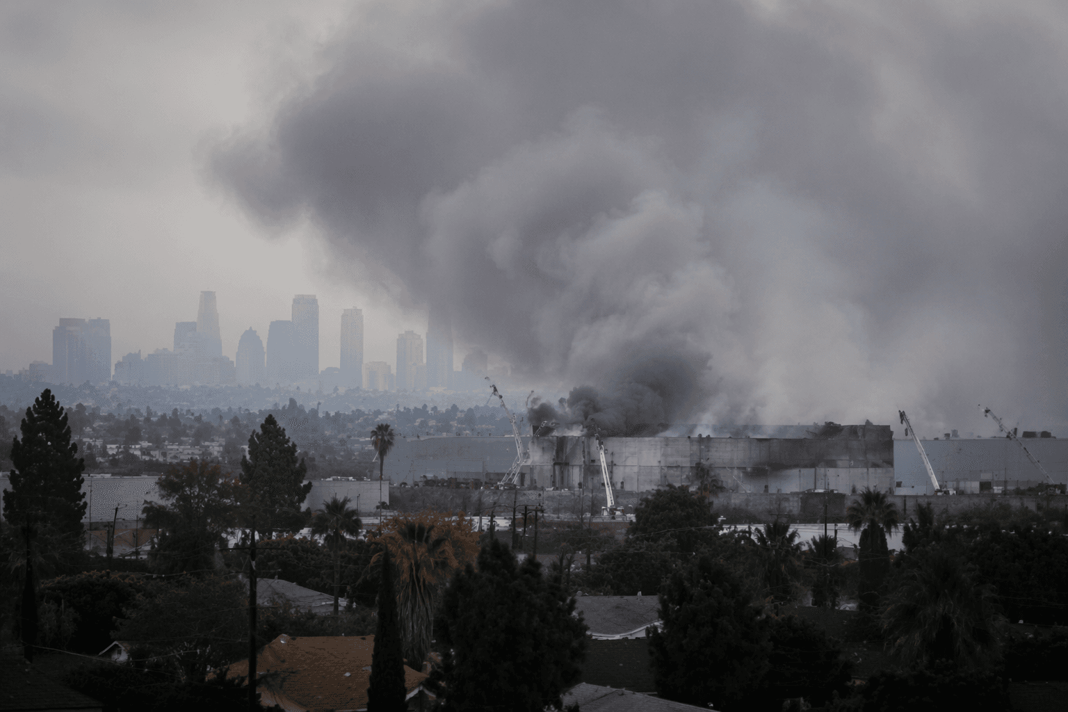 Los Angeles fire at frozen-food warehouse keeps spewing smoke after six days