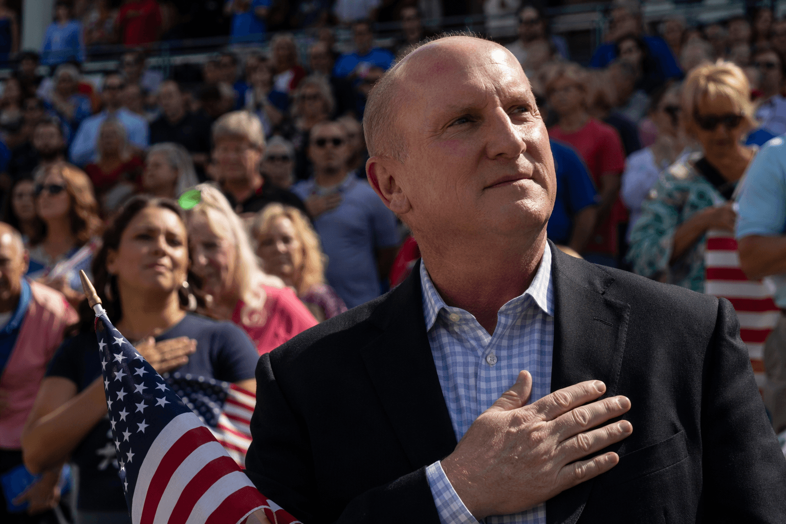 Berkshire Hathaway CEO Greg Abel becomes U.S. citizen at Iowa Cubs game