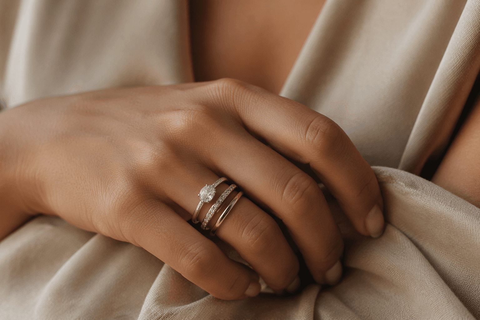 Bride stacks replace the single-band bridal ring formula