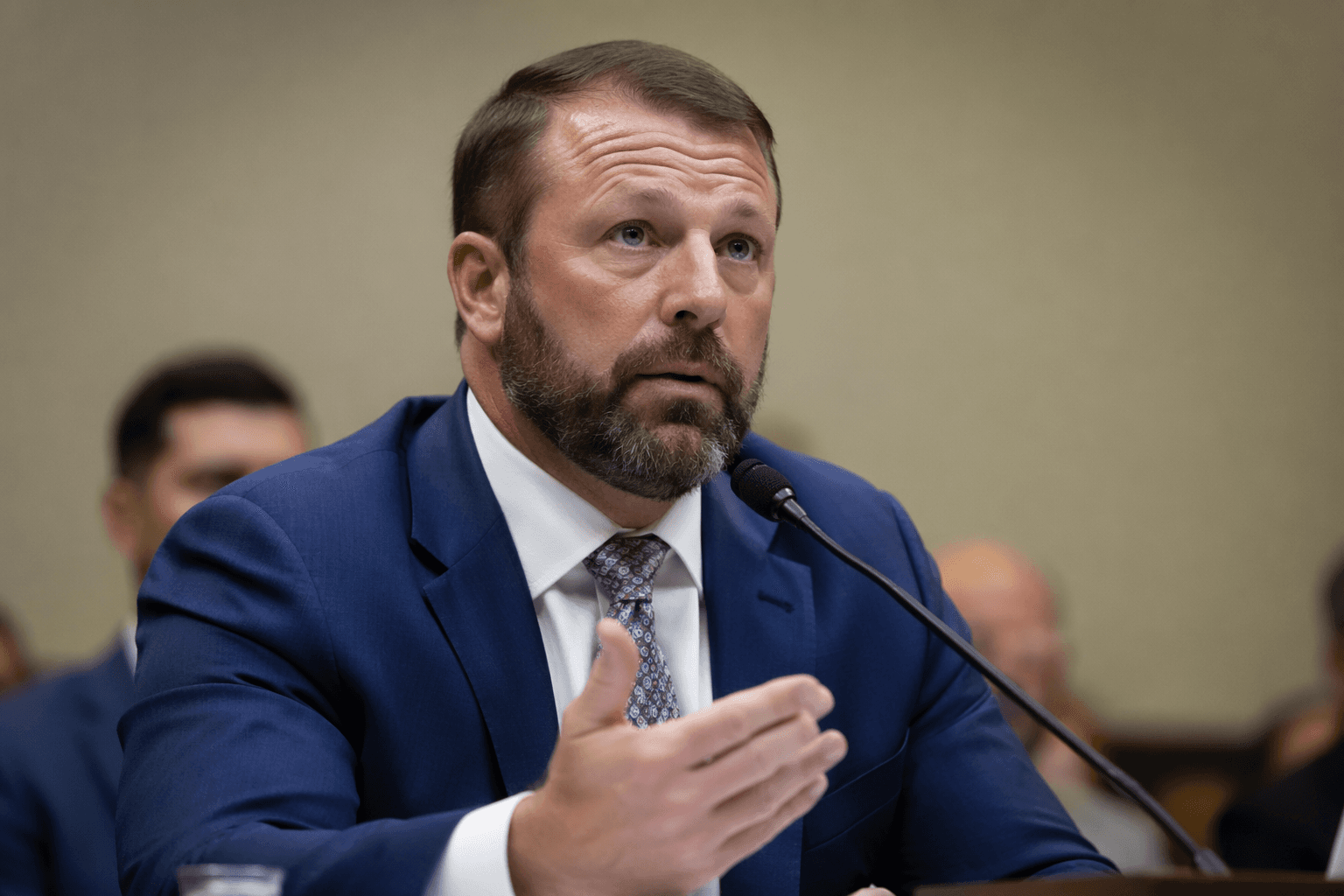 Mullin tells TPS migrants to stay legally or leave the US