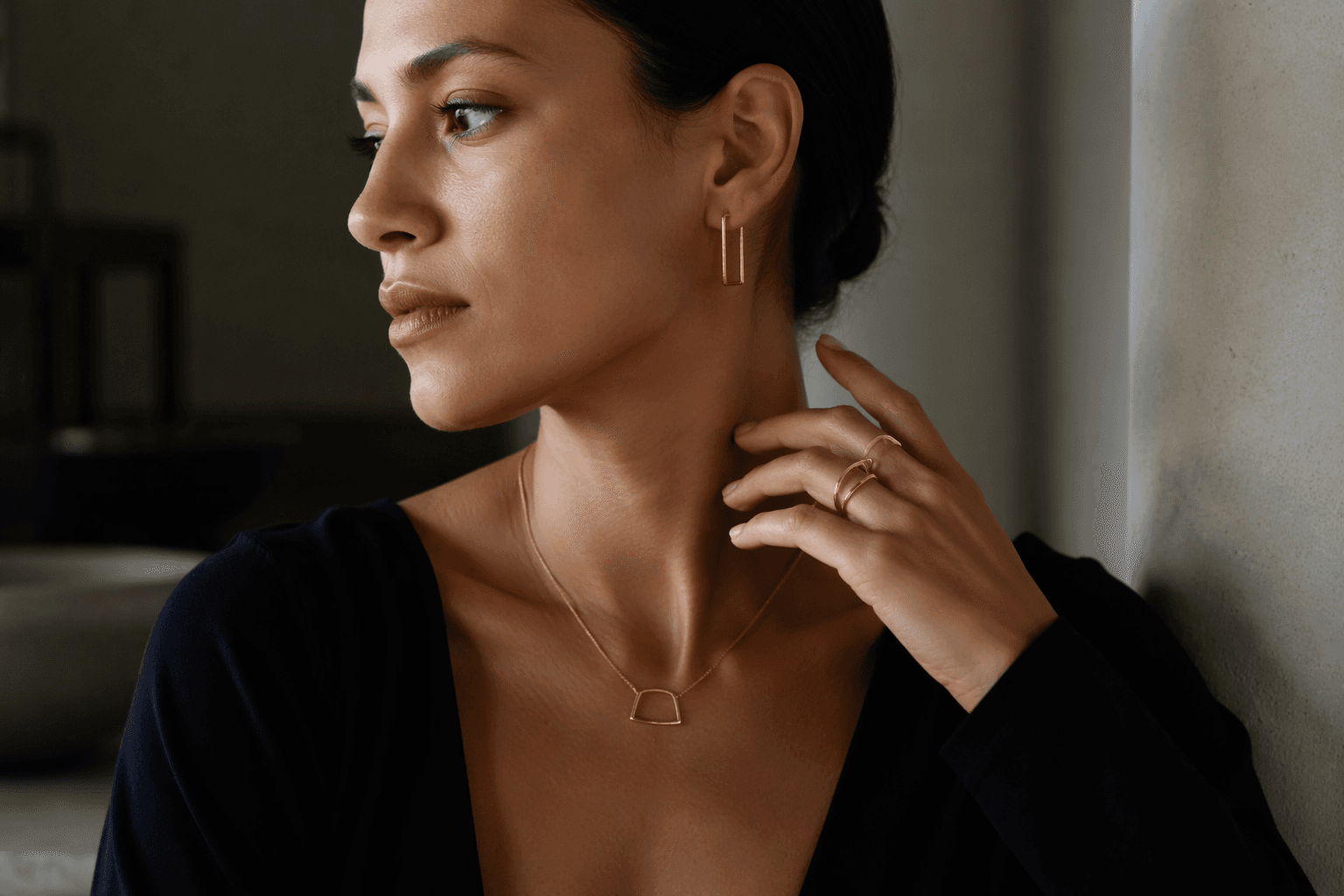 Negative space gives minimalist jewelry a luxurious edge
