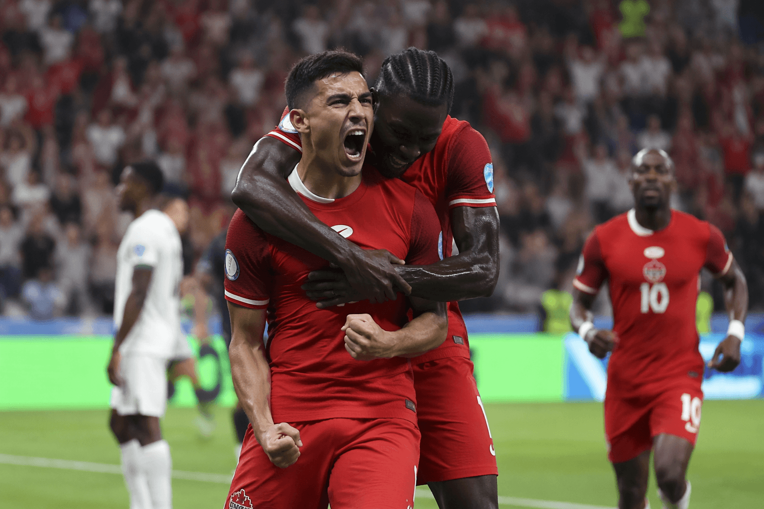 Canada beats South Africa, reaches World Cup Round of 16 for first time