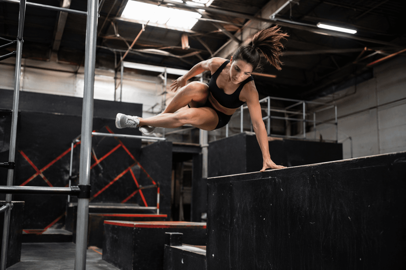 Britt Hertz tests gymnastics skills in parkour challenge videos