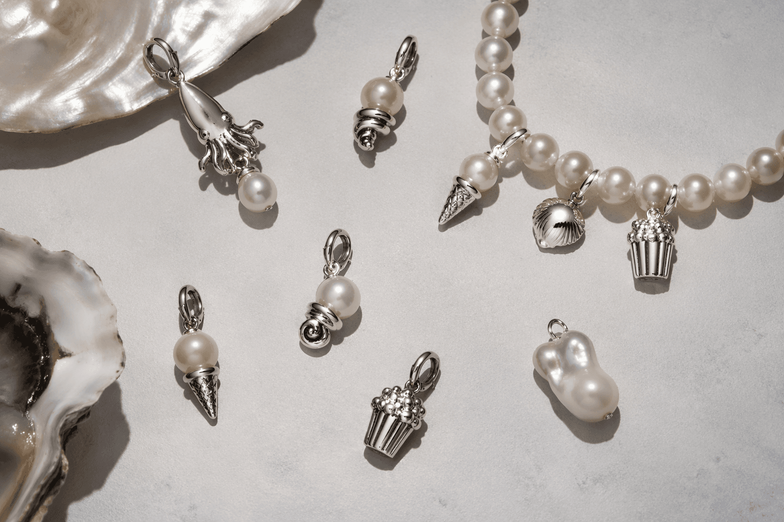 Pandora debuts limited pearl charms with Harry Lambert in Paris