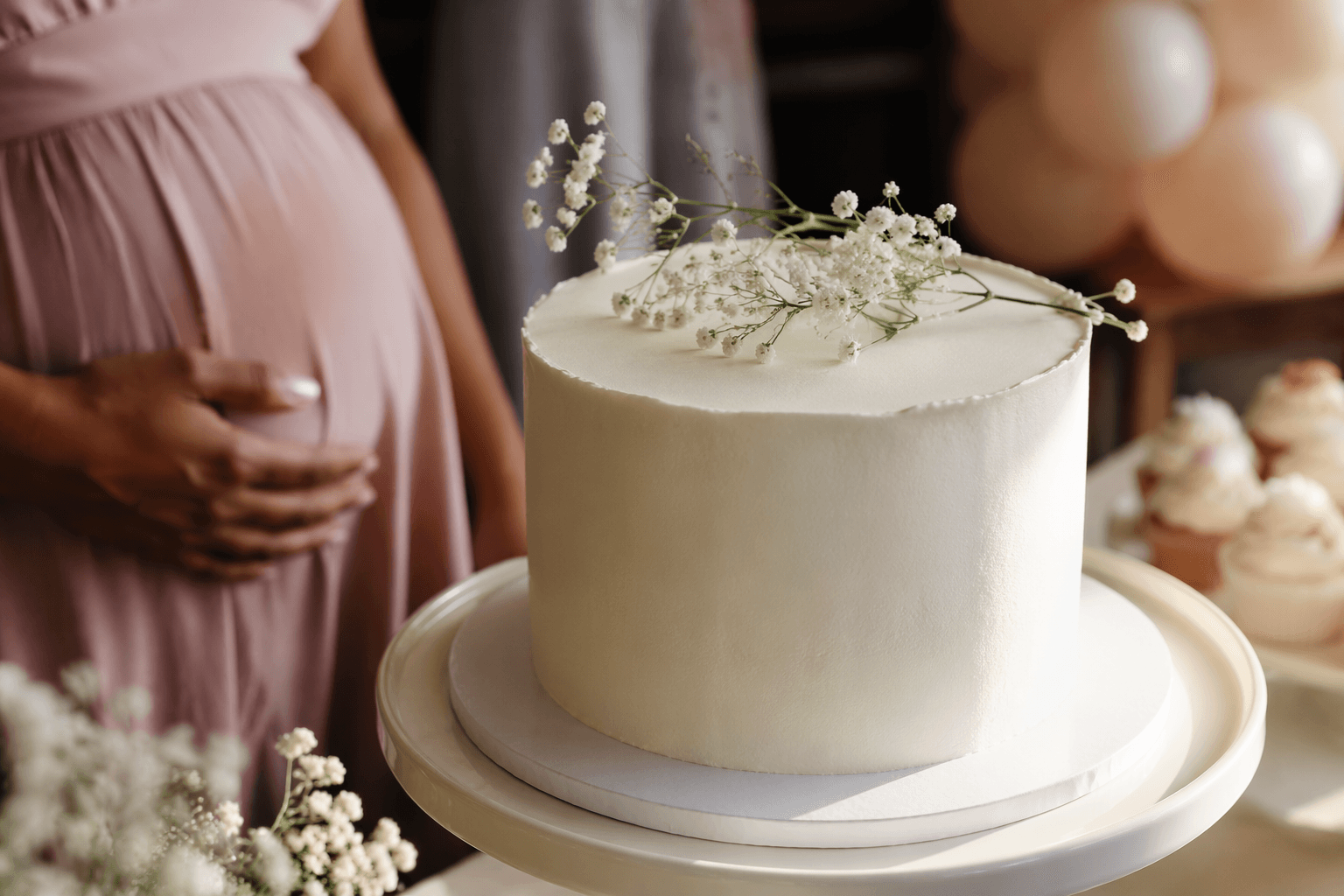 Minimalist baby shower cakes bring elegance without excess