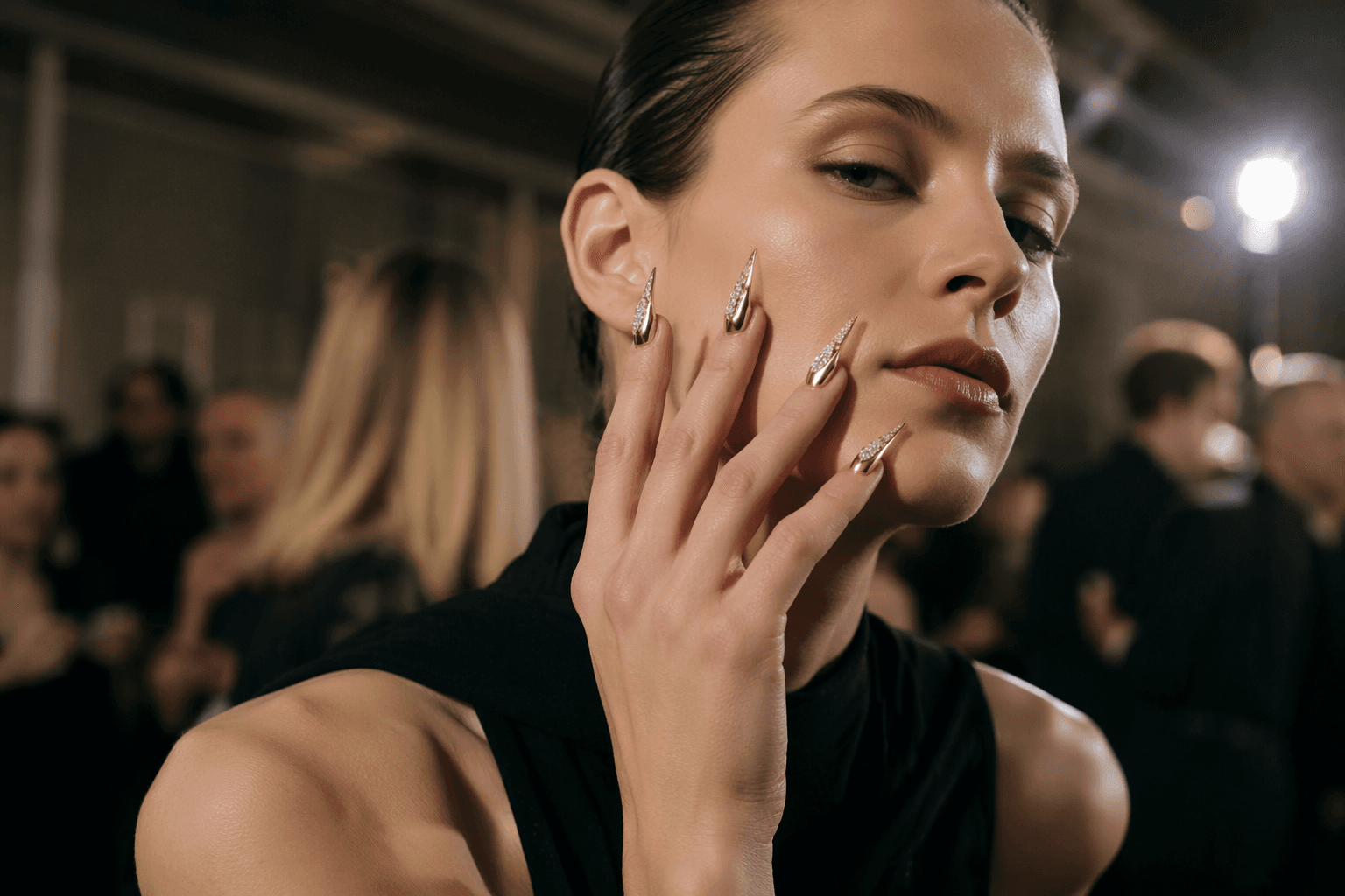 Mellerio revives 1951 nail jewelry in gem-set gold for couture week