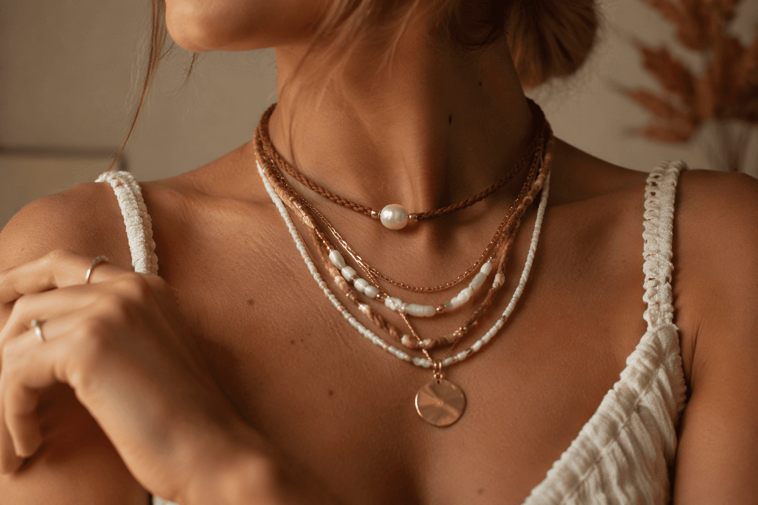 Summer necklace layering embraces fiber, leather and mixed textures