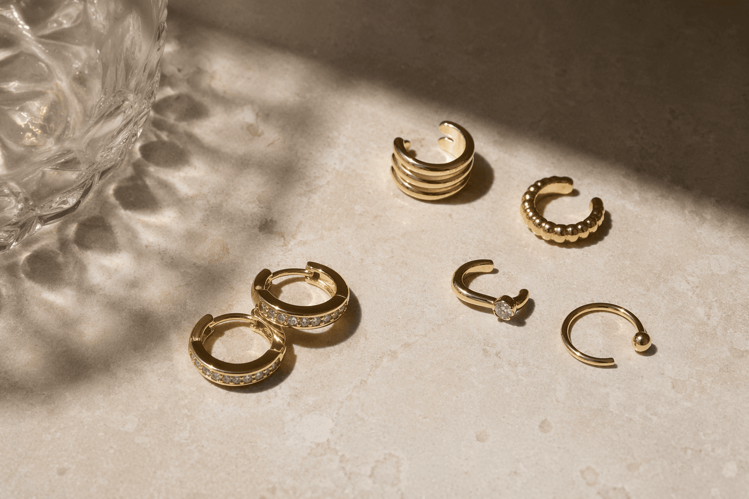 Gold cartilage earrings bring a polished, grown-up ear stack