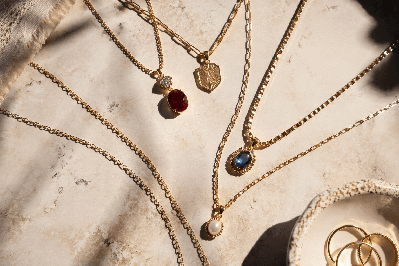 Colorful collar necklaces turn layering into a more personal statement