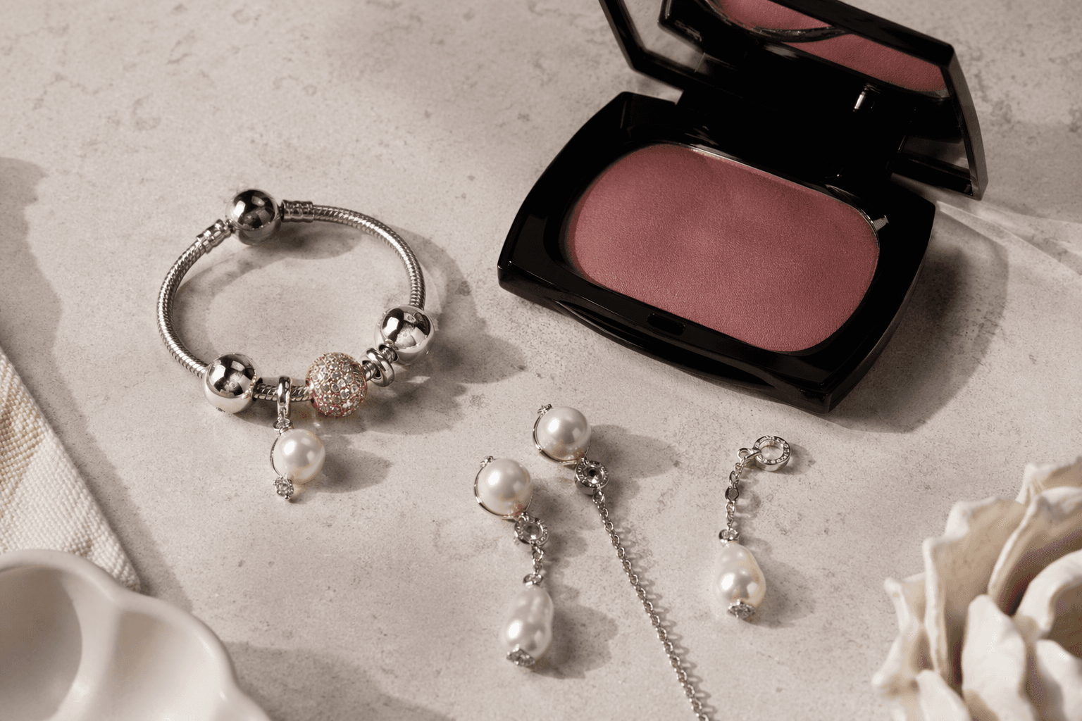 Prada Beauty launches Touch blush and Pandora debuts pearl jewellery collab