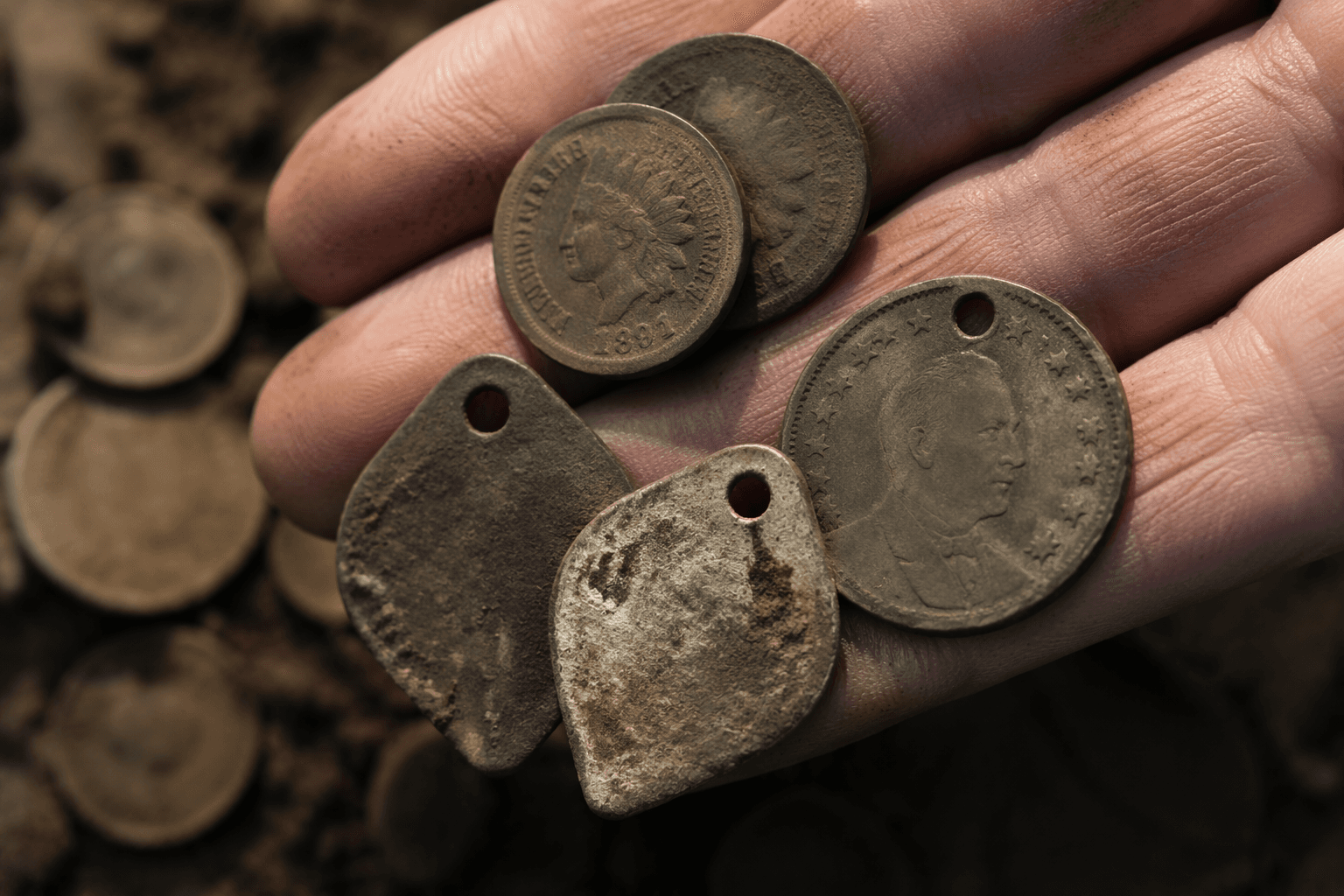 Old house hunt yields Indian cents, war button, 1928 campaign token