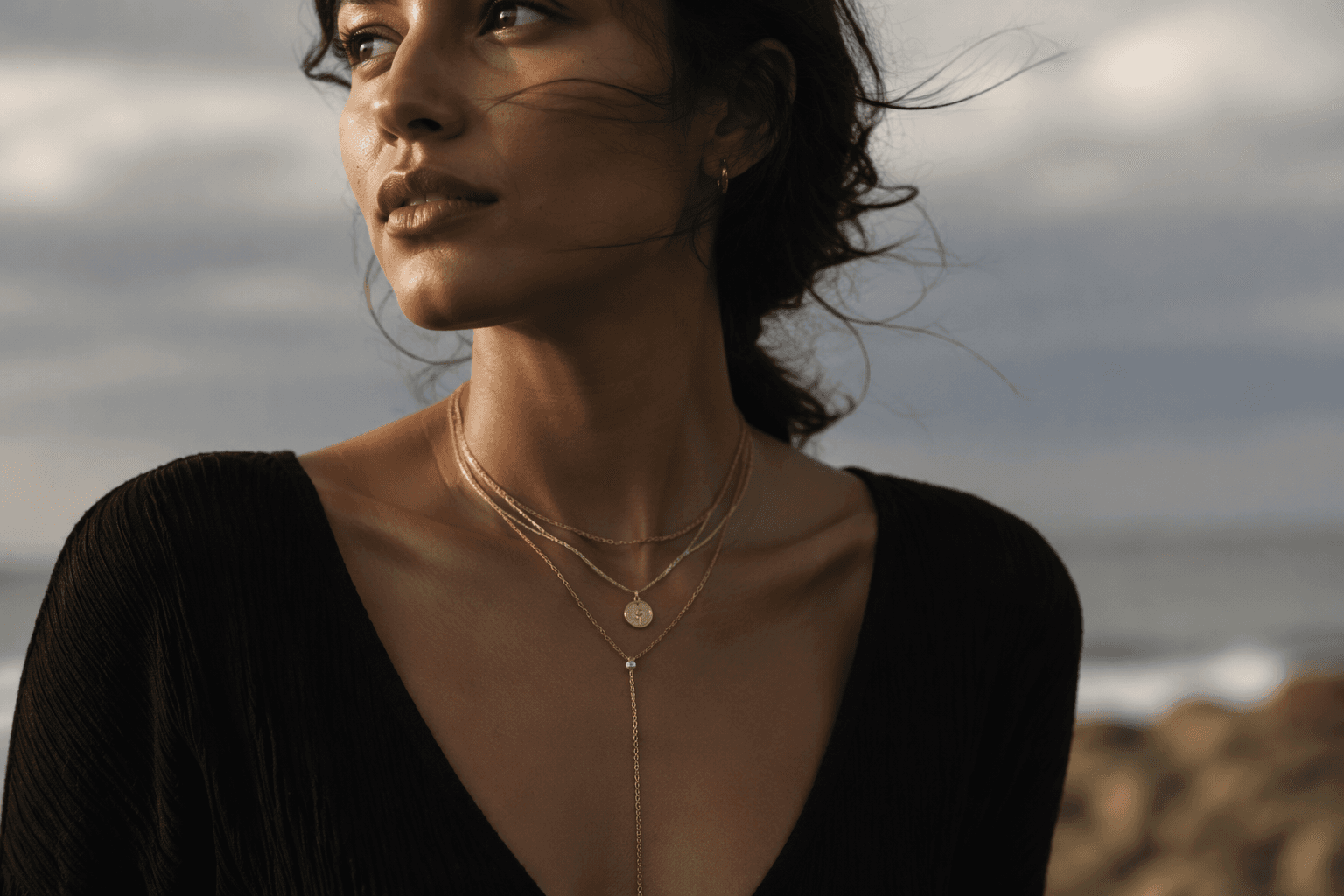 Why lariat necklaces anchor jewelry layering with a clean vertical line