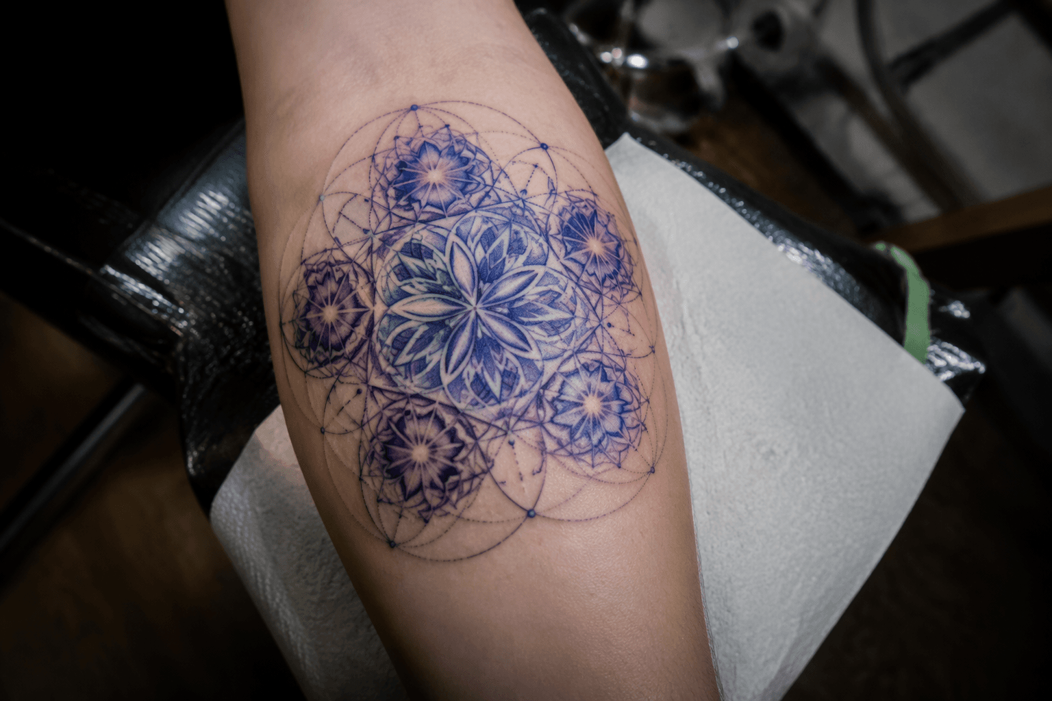 WescheTattoo reveals blue-purple geometric tattoo built from five centers