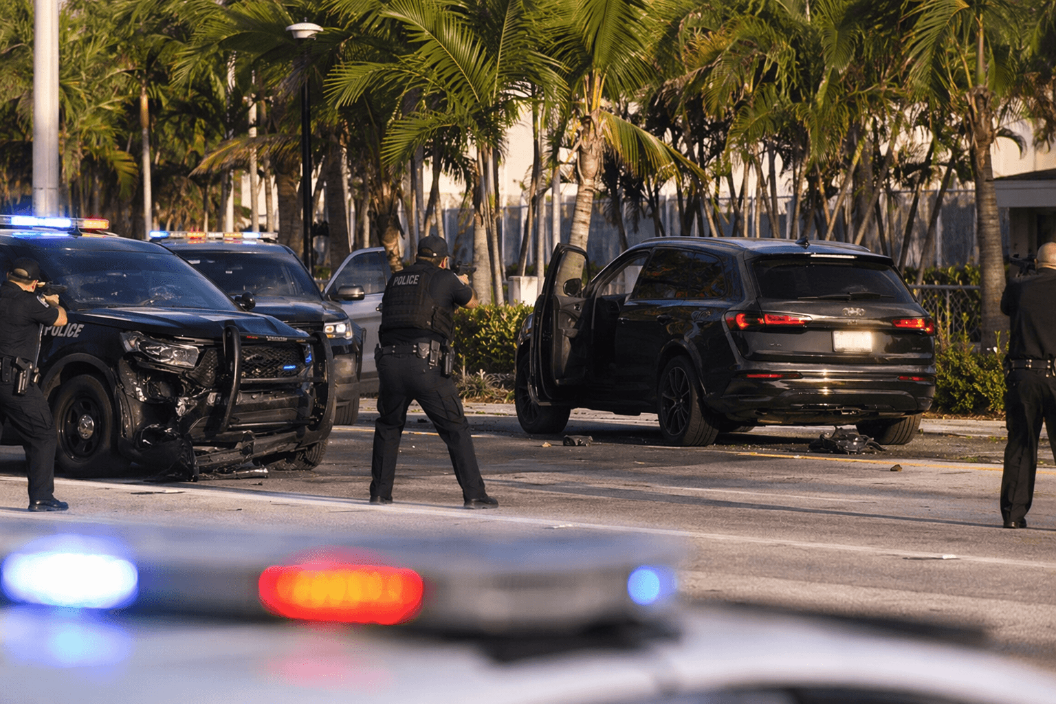 Stolen-car chase ends in guns-drawn standoff after police crash in Hollywood
