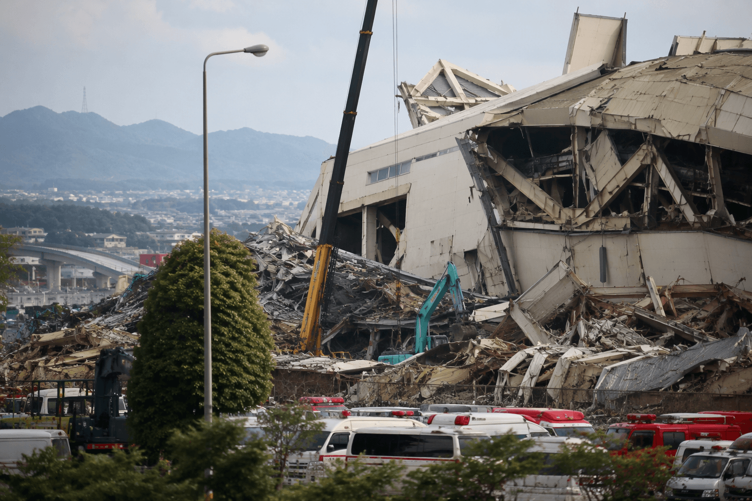 Japan quake death toll climbs as rescuers race in Kumamoto