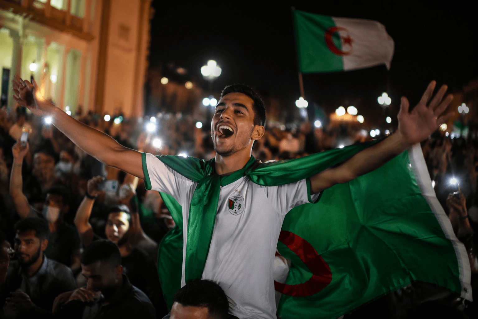 Lawrence residents cheer Algeria’s World Cup debut at street party