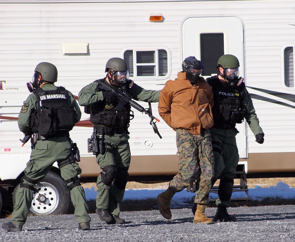 Man allegedly fires rifle at officers during Parsons arrest standoff